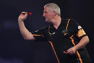 LONDON, ENGLAND - DECEMBER 22: Wayne Jones of England in action during his second round match against Joe Cullen of England during day eight of the PDC William Hill World Darts Championship at Alexandra Palace on December 22, 2020 in London, England. (Photo by Luke Walker/Getty Images)