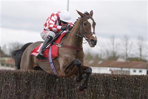 SUNBURY, ENGLAND - DECEMBER 26: Adam Wedge riding Killer Clown clear the last to win The Play Ladbrokes 5-A-Side On Football Novices' Limited Handicap Chase at Kempton Park Racecourse on December 26, 2020 in Sunbury, England. Owners are allowed to attend if they have a runner at the meeting otherwise racing remains behind closed doors to the public due to the Coronavirus pandemic. (Photo by Alan Crowhurst/Getty Images)