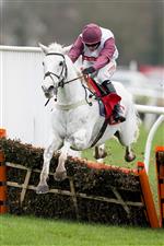 SUNBURY, ENGLAND - DECEMBER 26: Adam Wdge riding Silver Streak clear the last to win The Ladbrokes Christmas Hurdle at Kempton Park Racecourse on December 26, 2020 in Sunbury, England. Owners are allowed to attend if they have a runner at the meeting otherwise racing remains behind closed doors to the public due to the Coronavirus pandemic. (Photo by Alan Crowhurst/Getty Images)