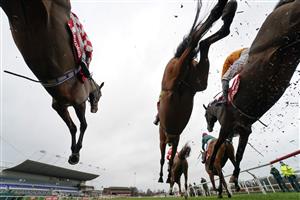 SUNBURY, ENGLAND - DECEMBER 26: Adam Wedge riding Killer Clown (L) on their way to winning The Play Ladbrokes 5-A-Side On Football Novices' Limited Handicap Chase at Kempton Park Racecourse on December 26, 2020 in Sunbury, England. Owners are allowed to attend if they have a runner at the meeting otherwise racing remains behind closed doors to the public due to the Coronavirus pandemic. (Photo by Alan Crowhurst/Getty Images)