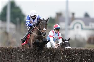 SUNBURY, ENGLAND - DECEMBER 26: Bryony Frost riding Frodon clear the last to win The Ladbrokes King George VI Chase at Kempton Park Racecourse on December 26, 2020 in Sunbury, England. Owners are allowed to attend if they have a runner at the meeting otherwise racing remains behind closed doors to the public due to the Coronavirus pandemic. (Photo by Alan Crowhurst/Getty Images)