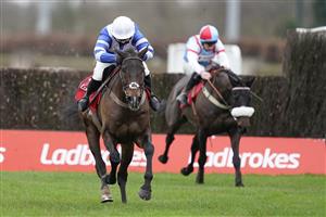 SUNBURY, ENGLAND - DECEMBER 26: Bryony Frost riding Frodon clear the last to win The Ladbrokes King George VI Chase at Kempton Park Racecourse on December 26, 2020 in Sunbury, England. Owners are allowed to attend if they have a runner at the meeting otherwise racing remains behind closed doors to the public due to the Coronavirus pandemic. (Photo by Alan Crowhurst/Getty Images)