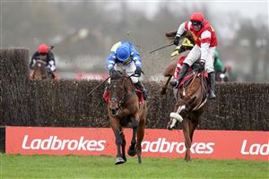 SUNBURY, ENGLAND - DECEMBER 26: Harry Skelton riding Shan Blue clear the last to win The Ladbrokes Kauto Star Novices' Chase as Robbie Power riding The BIg Breakaway blunder at Kempton Park Racecourse on December 26, 2020 in Sunbury, England. Owners are allowed to attend if they have a runner at the meeting otherwise racing remains behind closed doors to the public due to the Coronavirus pandemic. (Photo by Alan Crowhurst/Getty Images)