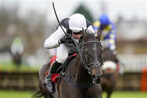 SUNBURY, ENGLAND - DECEMBER 26: Harry Skelton riding Third Time Lucki clear the last to win The Get Your Ladbrokes 1 Free Bet Novices' Hurdle at Kempton Park Racecourse on December 26, 2020 in Sunbury, England. Owners are allowed to attend if they have a runner at the meeting otherwise racing remains behind closed doors to the public due to the Coronavirus pandemic. (Photo by Alan Crowhurst/Getty Images)