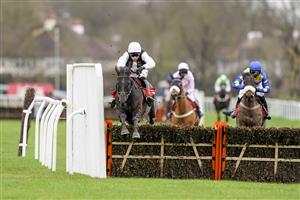 SUNBURY, ENGLAND - DECEMBER 26: Harry Skelton riding Third Time Lucki clear the last to win The Get Your Ladbrokes 1 Free Bet Novices' Hurdle at Kempton Park Racecourse on December 26, 2020 in Sunbury, England. Owners are allowed to attend if they have a runner at the meeting otherwise racing remains behind closed doors to the public due to the Coronavirus pandemic. (Photo by Alan Crowhurst/Getty Images)