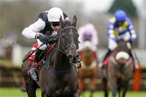 SUNBURY, ENGLAND - DECEMBER 26: Harry Skelton riding Third Time Lucki clear the last to win The Get Your Ladbrokes 1 Free Bet Novices' Hurdle at Kempton Park Racecourse on December 26, 2020 in Sunbury, England. Owners are allowed to attend if they have a runner at the meeting otherwise racing remains behind closed doors to the public due to the Coronavirus pandemic. (Photo by Alan Crowhurst/Getty Images)