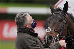 SUNBURY, ENGLAND - DECEMBER 26: Paul Nicholls with Frodon after he trains another winner of The Ladbrokes King George VI Chase at Kempton Park Racecourse on December 26, 2020 in Sunbury, England. Owners are allowed to attend if they have a runner at the meeting otherwise racing remains behind closed doors to the public due to the Coronavirus pandemic. (Photo by Alan Crowhurst/Getty Images)