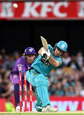 BRISBANE, AUSTRALIA - DECEMBER 27: Sam Heazlett of the Heat hits the ball over the boundary for a six during the Big Bash League match between the Brisbane Heat and the Hobart Hurricanes at The Gabba, on December 27, 2020, in Brisbane, Australia. (Photo by Bradley Kanaris/Getty Images)