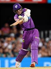 BRISBANE, AUSTRALIA - DECEMBER 27: Nathan Ellis of the Hurricanes plays a shot during the Big Bash League match between the Brisbane Heat and the Hobart Hurricanes at The Gabba, on December 27, 2020, in Brisbane, Australia. (Photo by Bradley Kanaris/Getty Images)