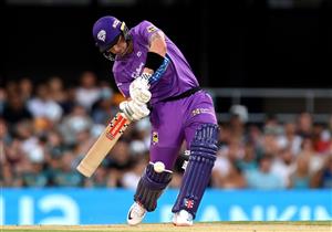 BRISBANE, AUSTRALIA - DECEMBER 27: Ben McDermott of the Hurricanes hits a six during the Big Bash League match between the Brisbane Heat and the Hobart Hurricanes at The Gabba, on December 27, 2020, in Brisbane, Australia. (Photo by Bradley Kanaris/Getty Images)