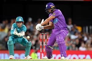 BRISBANE, AUSTRALIA - DECEMBER 27: Tim David of the Hurricanes plays a shot during the Big Bash League match between the Brisbane Heat and the Hobart Hurricanes at The Gabba, on December 27, 2020, in Brisbane, Australia. (Photo by Bradley Kanaris/Getty Images)