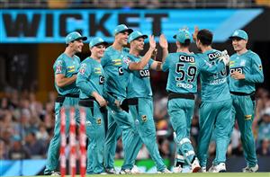 BRISBANE, AUSTRALIA - DECEMBER 27: Lewis Gregory of the Heat celebrates taking a wicket during the Big Bash League match between the Brisbane Heat and the Hobart Hurricanes at The Gabba, on December 27, 2020, in Brisbane, Australia. (Photo by Bradley Kanaris/Getty Images)