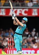BRISBANE, AUSTRALIA - DECEMBER 27: Sam Heazlett of the Heat hits the ball over the boundary for a six during the Big Bash League match between the Brisbane Heat and the Hobart Hurricanes at The Gabba, on December 27, 2020, in Brisbane, Australia. (Photo by Bradley Kanaris/Getty Images)
