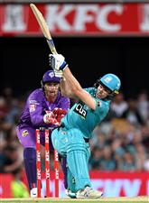 BRISBANE, AUSTRALIA - DECEMBER 27: Sam Heazlett of the Heat hits the ball over the boundary for a six during the Big Bash League match between the Brisbane Heat and the Hobart Hurricanes at The Gabba, on December 27, 2020, in Brisbane, Australia. (Photo by Bradley Kanaris/Getty Images)