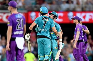 BRISBANE, AUSTRALIA - DECEMBER 27: Jimmy Peirson and James Bazley of the Heat celebrate victory after the Big Bash League match between the Brisbane Heat and the Hobart Hurricanes at The Gabba, on December 27, 2020, in Brisbane, Australia. (Photo by Bradley Kanaris/Getty Images)