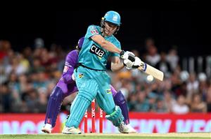 BRISBANE, AUSTRALIA - DECEMBER 27: Sam Heazlett of the Heat hits the ball over the boundary for a six during the Big Bash League match between the Brisbane Heat and the Hobart Hurricanes at The Gabba, on December 27, 2020, in Brisbane, Australia. (Photo by Bradley Kanaris/Getty Images)