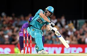 BRISBANE, AUSTRALIA - DECEMBER 27: Sam Heazlett of the Heat hits the ball over the boundary for a six during the Big Bash League match between the Brisbane Heat and the Hobart Hurricanes at The Gabba, on December 27, 2020, in Brisbane, Australia. (Photo by Bradley Kanaris/Getty Images)