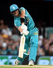 BRISBANE, AUSTRALIA - DECEMBER 27: James Bazley of the Heat hits the ball over the boundary for a six during the Big Bash League match between the Brisbane Heat and the Hobart Hurricanes at The Gabba, on December 27, 2020, in Brisbane, Australia. (Photo by Bradley Kanaris/Getty Images)