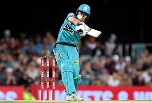 BRISBANE, AUSTRALIA - DECEMBER 27: Sam Heazlett of the Heat hits the ball over the boundary for a six during the Big Bash League match between the Brisbane Heat and the Hobart Hurricanes at The Gabba, on December 27, 2020, in Brisbane, Australia. (Photo by Bradley Kanaris/Getty Images)