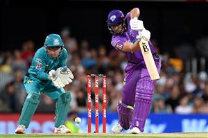 BRISBANE, AUSTRALIA - DECEMBER 27: Tim David of the Hurricanes plays a shot during the Big Bash League match between the Brisbane Heat and the Hobart Hurricanes at The Gabba, on December 27, 2020, in Brisbane, Australia. (Photo by Bradley Kanaris/Getty Images)