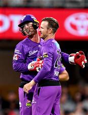 BRISBANE, AUSTRALIA - DECEMBER 27: Darcy Short of the Hurricanes celebrates taking the wicket of Max Bryant of the Heat during the Big Bash League match between the Brisbane Heat and the Hobart Hurricanes at The Gabba, on December 27, 2020, in Brisbane, Australia. (Photo by Bradley Kanaris/Getty Images)
