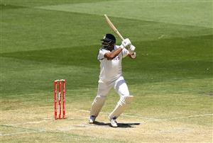 MELBOURNE, AUSTRALIA - DECEMBER 28: Ravi Ashwin of India hits out during day three of the Second Test match between Australia and India at Melbourne Cricket Ground on December 28, 2020 in Melbourne, Australia. (Photo by Robert Cianflone/Getty Images)