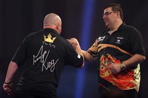 LONDON, ENGLAND - DECEMBER 28: Mervyn King of England (L) and José de Sousa of Portugal congratulate each other after there third round match against during day eleven of the PDC William Hill World Darts Championship at Alexandra Palace on December 28, 2020 in London, England. (Photo by Luke Walker/Getty Images)