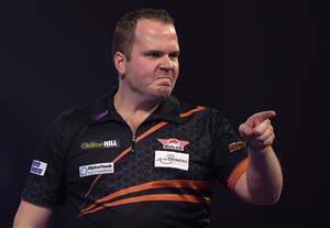 LONDON, ENGLAND - DECEMBER 28: Dirk van Duijvenbode of The Neatherlands reacts during his third round match against Adam Hunt of England during day eleven of the PDC William Hill World Darts Championship at Alexandra Palace on December 28, 2020 in London, England. (Photo by Luke Walker/Getty Images)