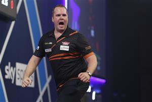 LONDON, ENGLAND - DECEMBER 28: Dirk van Duijvenbode of The Netherlands reacts during his third round match against Adam Hunt of England during day eleven of the PDC William Hill World Darts Championship at Alexandra Palace on December 28, 2020 in London, England. (Photo by Luke Walker/Getty Images)