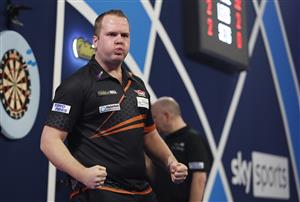 LONDON, ENGLAND - DECEMBER 28: Dirk van Duijvenbode of The Netherlands reacts during his third round match against Adam Hunt of England during day eleven of the PDC William Hill World Darts Championship at Alexandra Palace on December 28, 2020 in London, England. (Photo by Luke Walker/Getty Images)