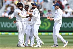 MELBOURNE, AUSTRALIA - DECEMBER 28: Jasprit Bumrah of India celebrates getting the wicket of Steve Smith of Australia during day three of the Second Test match between Australia and India at Melbourne Cricket Ground on December 28, 2020 in Melbourne, Australia. (Photo by Quinn Rooney/Getty Images)