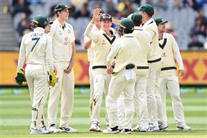 MELBOURNE, AUSTRALIA - DECEMBER 28: Marnus Labuschagne of Australia is congratulated by team mates after running out Ajinkya Rahane of India during day three of the Second Test match between Australia and India at Melbourne Cricket Ground on December 28, 2020 in Melbourne, Australia. (Photo by Quinn Rooney/Getty Images)