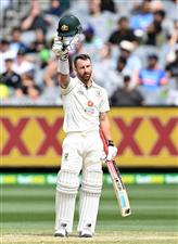 MELBOURNE, AUSTRALIA - DECEMBER 28: Matthew Wade of Australia calls for a new helmet after being struck on the helmet by a delivery from Jasprit Bumrah of India during day three of the Second Test match between Australia and India at Melbourne Cricket Ground on December 28, 2020 in Melbourne, Australia. (Photo by Quinn Rooney/Getty Images)