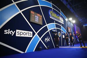LONDON, ENGLAND - DECEMBER 28: Nathan Aspinall of England in action during his third round match against Vincent van der Voort of The Netherlands during day eleven of the PDC William Hill World Darts Championship at Alexandra Palace on December 28, 2020 in London, England. (Photo by Luke Walker/Getty Images)