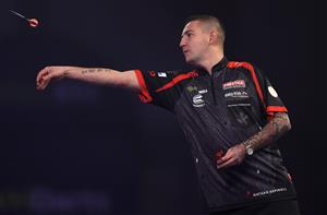 LONDON, ENGLAND - DECEMBER 28: Nathan Aspinall of England in action during his third round match against Vincent van der Voort of The Netherlands during day eleven of the PDC William Hill World Darts Championship at Alexandra Palace on December 28, 2020 in London, England. (Photo by Luke Walker/Getty Images)