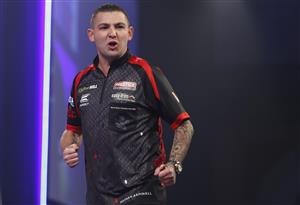 LONDON, ENGLAND - DECEMBER 28: Nathan Aspinall of England reacts during his third round match against Vincent van der Voort of The Netherlands during day eleven of the PDC William Hill World Darts Championship at Alexandra Palace on December 28, 2020 in London, England. (Photo by Luke Walker/Getty Images)