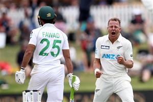 TAURANGA, NEW ZEALAND - DECEMBER 28: Neil Wagner of New Zealand celebrates his wicket of Fawad Alam of Pakistan (L) during day three of the First Test match in the series between New Zealand and Pakistan at Bay Oval on December 28, 2020 in Tauranga, New Zealand. (Photo by Phil Walter/Getty Images)