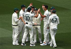 MELBOURNE, AUSTRALIA - DECEMBER 28: Pat Cummins of Australia celebrates after taking a catch to dismiss Ravindra Jadeja of India during day three of the Second Test match between Australia and India at Melbourne Cricket Ground on December 28, 2020 in Melbourne, Australia. (Photo by Robert Cianflone/Getty Images)