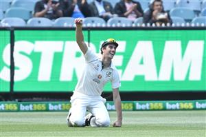 MELBOURNE, AUSTRALIA - DECEMBER 28: Pat Cummins of Australia takes a catch to dismiss Ravindra Jadeja of India during day three of the Second Test match between Australia and India at Melbourne Cricket Ground on December 28, 2020 in Melbourne, Australia. (Photo by Quinn Rooney/Getty Images)