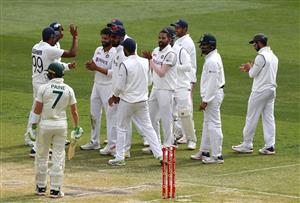 MELBOURNE, AUSTRALIA - DECEMBER 28: Ravindra Jadeja of India celebrates taking the wicket of Tim Paine of Australia during day three of the Second Test match between Australia and India at Melbourne Cricket Ground on December 28, 2020 in Melbourne, Australia. (Photo by Robert Cianflone/Getty Images)