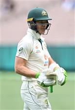 MELBOURNE, AUSTRALIA - DECEMBER 28: Tim Paine of Australia walks off the field after being dismissed by Ravindra Jadeja of India during day three of the Second Test match between Australia and India at Melbourne Cricket Ground on December 28, 2020 in Melbourne, Australia. (Photo by Quinn Rooney/Getty Images)
