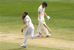 MELBOURNE, AUSTRALIA - DECEMBER 28: Mohammed Siraj of India celebrates taking the wicket of Travis Head of Australia during day three of the Second Test match between Australia and India at Melbourne Cricket Ground on December 28, 2020 in Melbourne, Australia. (Photo by Robert Cianflone/Getty Images)