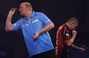LONDON, ENGLAND - DECEMBER 28: Vincent van der Voort of The Netherlands in action during his third round match against Nathan Aspinall of England during day eleven of the PDC William Hill World Darts Championship at Alexandra Palace on December 28, 2020 in London, England. (Photo by Luke Walker/Getty Images)