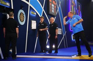 LONDON, ENGLAND - DECEMBER 28: Vincent van der Voort of The Netherlands in action during his third round match against Nathan Aspinall of England during day eleven of the PDC William Hill World Darts Championship at Alexandra Palace on December 28, 2020 in London, England. (Photo by Luke Walker/Getty Images)