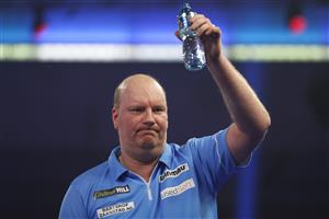 LONDON, ENGLAND - DECEMBER 28: Vincent van der Voort of The Netherlands reacts during his third round match against Nathan Aspinall of England during day eleven of the PDC William Hill World Darts Championship at Alexandra Palace on December 28, 2020 in London, England. (Photo by Luke Walker/Getty Images)