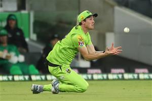 CANBERRA, AUSTRALIA - DECEMBER 29: Adam Milne of the Thunder cates out Glenn Maxwell of the Stars during the Big Bash League match between Sydney Thunder and the Melbourne Stars at Manuka Oval, on December 29, 2020, in Canberra, Australia. (Photo by Mike Owen/Getty Images)
