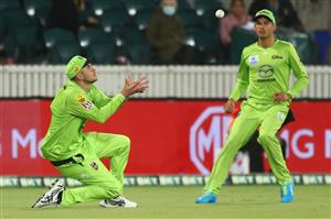 CANBERRA, AUSTRALIA - DECEMBER 29: Alex Hales of the Thunder catches out Nicholas Pooran of the Stars during the Big Bash League match between Sydney Thunder and the Melbourne Stars at Manuka Oval, on December 29, 2020, in Canberra, Australia. (Photo by Mike Owen/Getty Images)