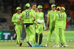 CANBERRA, AUSTRALIA - DECEMBER 29: Chris Green (3l) of the Thunder celebrates with teammates after bowling out Nic Maddinson of the Stars during the Big Bash League match between Sydney Thunder and the Melbourne Stars at Manuka Oval, on December 29, 2020, in Canberra, Australia. (Photo by Mike Owen/Getty Images)