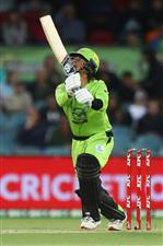CANBERRA, AUSTRALIA - DECEMBER 29: Ollie Davies of the Thunder hits out during the Big Bash League match between Sydney Thunder and the Melbourne Stars at Manuka Oval, on December 29, 2020, in Canberra, Australia. (Photo by Mike Owen/Getty Images)