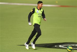 CANBERRA, AUSTRALIA - DECEMBER 29: Tanveer Sangha of the Thunder warms up prior to the Big Bash League match between Sydney Thunder and the Melbourne Stars at Manuka Oval, on December 29, 2020, in Canberra, Australia. (Photo by Mike Owen/Getty Images)